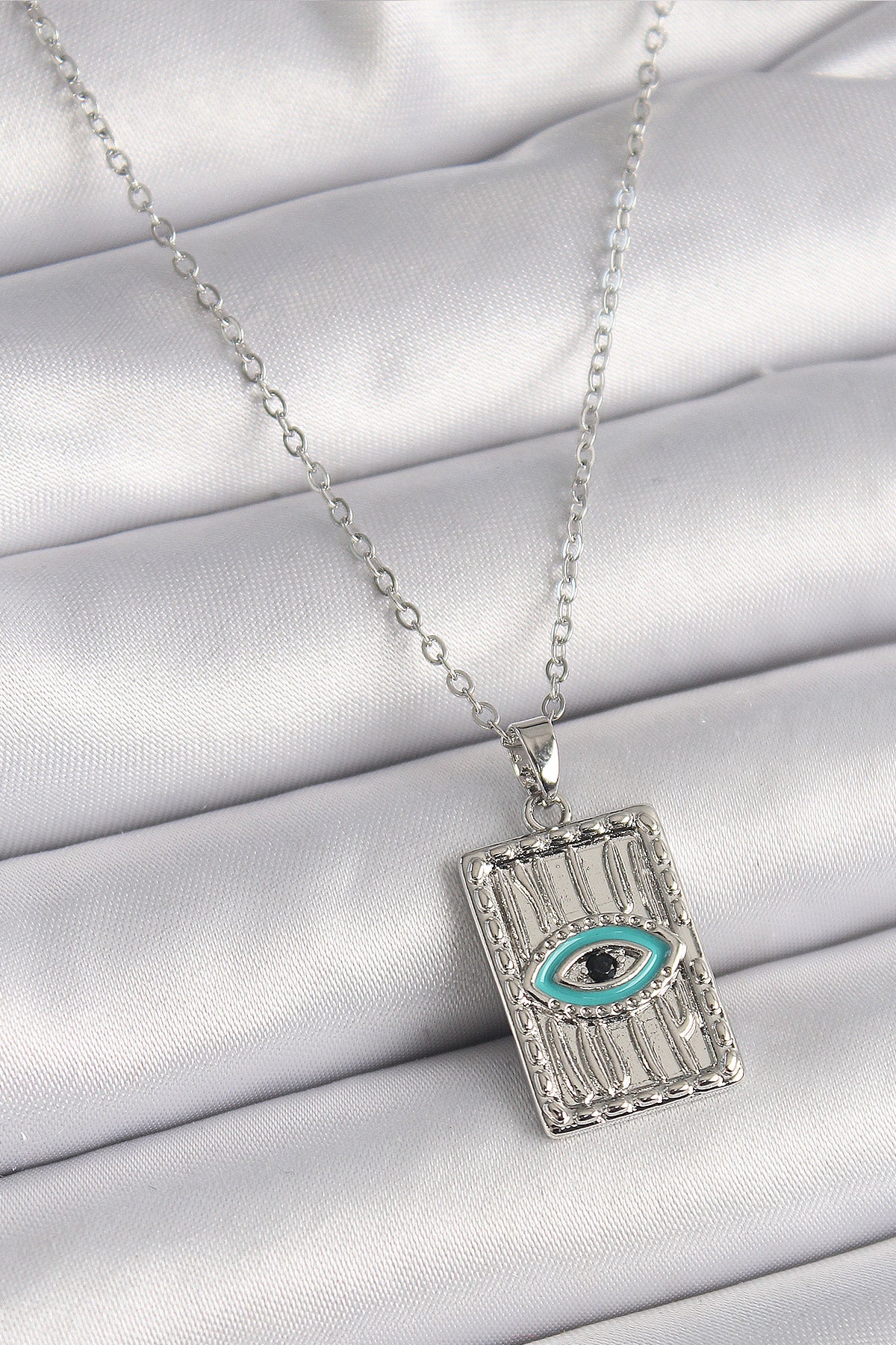 316L Çelik Gümüş Renk Zirkon Taşlı Göz İşleme Detaylı Plaka Model Kadın Kolye